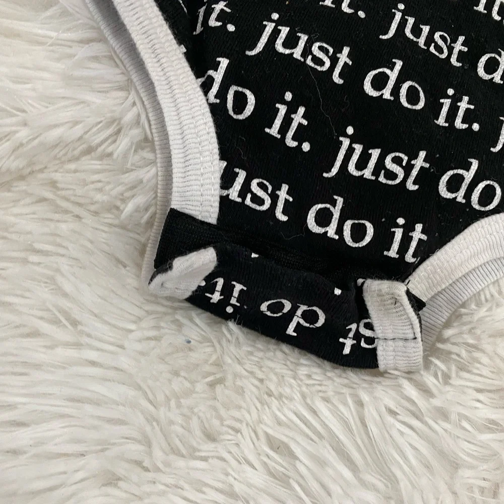 Nike baby Just do it logo black and white onesie 0-6 M